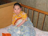 This precious child  was fine with our camera, but overall seemed scared to be i n the crib.