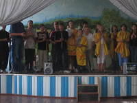 The high schoolers perform a skit about Ananias and Sapphira, explaining the importance of honesty