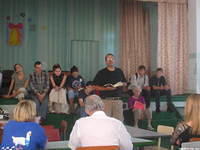 Each day, before we went to the camp, all team members attended a devotion.  Here Rich Fillmon leads.