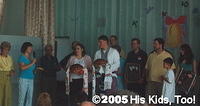 At the close of camp, the school director presented the group with the traditional bread.