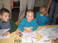 This little girl is proud of her work.