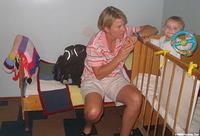With Frieda's blankets in the background, Karen warms up to this little boy.
