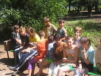 Teen girls listen attentively.