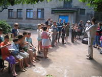 The children are told 'what' is in each personal care bag, prior to distribution.
