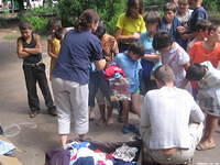 Teresa and the other volunteers work quickly, as to make the children wait too long.