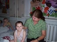 Teresa visits with Alyona.