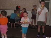 The little ones enjoy their bananas!  Thank you Jen  and Mark S. for the funds for these bananas.