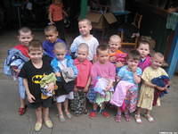 With their new clothes.  One boy just loved the 'Batman' shirt, he had to put it on immediately.