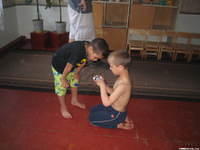 These 2 boys share their toys.
