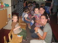 Sarah (Valdosta, GA), and Masha, play with the children.