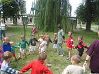 The kids play a common children's game.