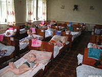 Over 60 children just lie in bed all day without care...it is terribly sad.  Workers are over worked and underpaid.