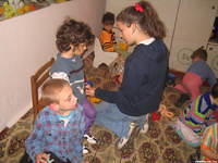 Haley enjoys playing with the children.
