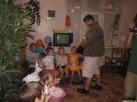 Volunteer Danny W. passes out toys.
