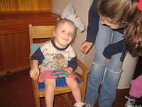 Haley visits with this 'chair bound' girl.