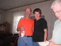 Eric (Gainesville Fl), and Vanya, place filled bags into the canvas bags.