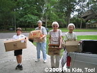 Our SUPER Seniors, Frieda, Lucille, and  Nell, carry boxes filled with  diapers, hats, baby items, toys and much more.  Artur F.