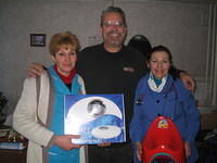 His Kids, Too! board member pictured here with the head Dr. and Head nurse for the orpahn unit of this hospital.  They received