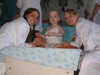 Both Ashley and Haley help this boy.  He was very happy.