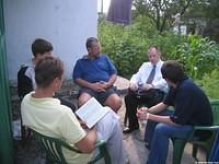 We had daily Bible studies, and were bless to have 3 orphan teens join us.  Here, outside, some of the men have a discussion.