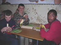 The older teens enjoy the fruit and cookies.
