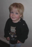 This percocious boy waited patiently for his photo opt.