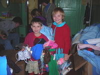 They could hardly hold all their goodies!  Thanks to Raa Middle school for the clothing and Barbies!