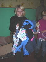 She was quite happy with her new coat and clothes.