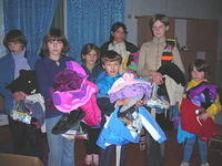 Girls received armfuls of clothing.
