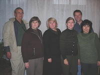 His Kids, Too! board members, Lynn, Ray, Walter and director, Teresa pose with Internot director, and other personnel.