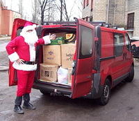 ...and then...Santa appeared with the loaded van.