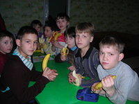 After services, children enjoy a fruit snack.  Thanks to Lowndes Co. High School.
