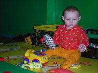 Dima enjoys the wonderful toys!