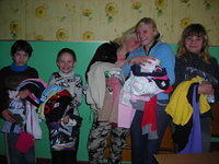 These young girls are excited about their new clothes.