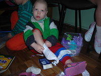 This little guy just HAD to put on his new socks!