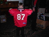 This boy was VERY pleased with his new Tampa Bay Bucaneer jersey.