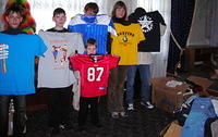 Some of the kids show off their new clothing.