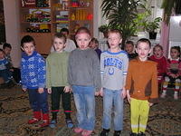 The children are well cared for.  Here they honor us by singing.