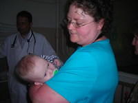 Then we visited an orphan hospital.  Darlene spends some time with this 4 month old.