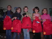 Thanks to Glendale Rd. Church of Christ, these young ladies received great backpacks stuffed with clothes.