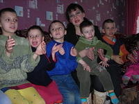 At the Enavikov Shelter the children sing for us...