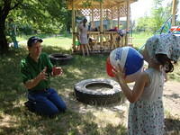 Mark and Lyuba play ball