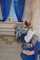 curtains, kitchen table, chairs