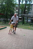 Ted walking with this visually impaired girl.