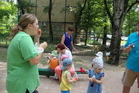 Melissa blows bubbles for the kids.