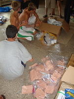 Kids helping make up the care bags.