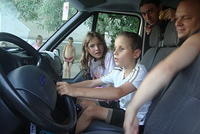 The boy insisted on driving the van.