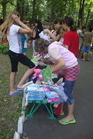 The girls were a wonderful help in setting up the clothes ready for kids to make their selections.