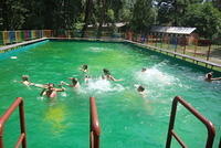 They really do have swimming pools in Ukraine.  This one is at the orphans camp.