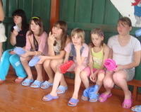 The girls with their shoes.